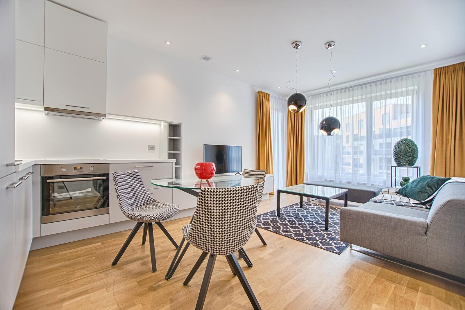 two-chairs-with-glass-table-on-living-room-near-window two-chairs-with-glass-table-on-living-room-near-window